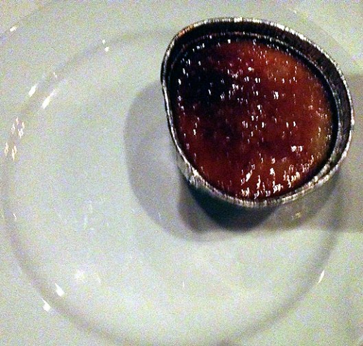 The much-anticipated creme brulee' came to the table on this blank white saucer and partially squashed. Oh, and burnt!